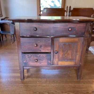 Lot 91. 1920s vintage commodeâ€”three drawers newly repaired and one cupboard--$30 