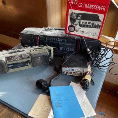 Lot 99. Two radios (AM/FM, tape decks, one Realistic 40-channel CB transceiver with antenna--$50