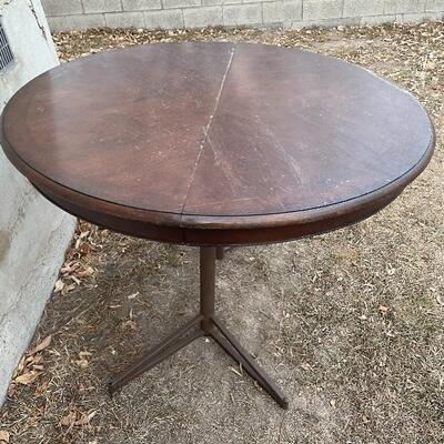 Wood table with metal legs