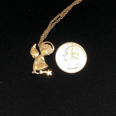 Lot 6 - Avon Moving Child Angel Pendant on Gold Tone Chain