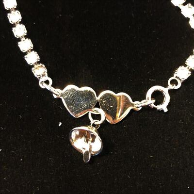 Lot 14 - Clear Stone Tennis Bracelet with Heart Clasp