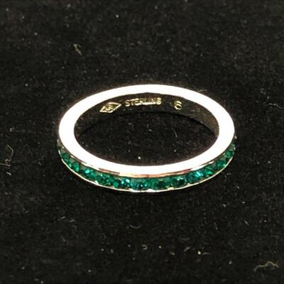 Lot 22 - Sterling Silver Eternity Ring with Green Stones