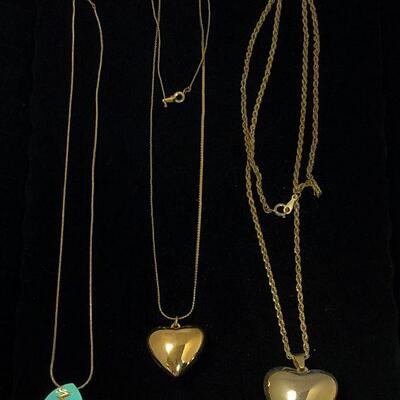 Lot 42 - Three Necklaces with Pendants