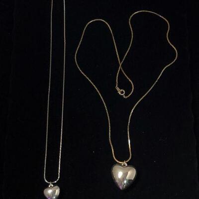 Lot 44 - Two Silver Tone Necklaces with Hearts