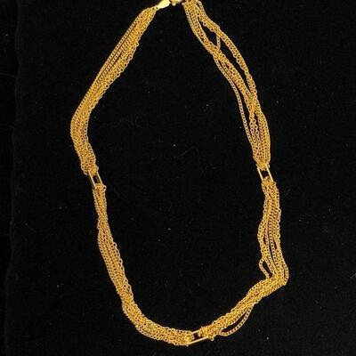 Lot 51 - Multi-Strand Gold Tone Necklace