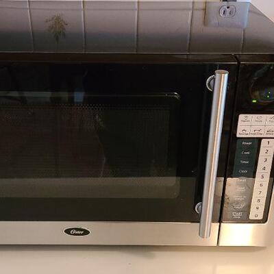 Lot 112 K: Oster Microwave/ Proctor Toaster