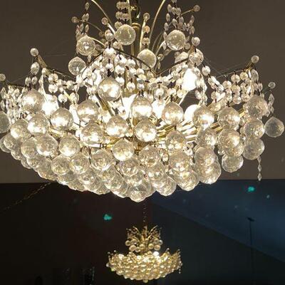 LOT 1. MODERNIST DESIGN CRYSTAL SWAG CRYSTAL CHANDELIER AS IS 