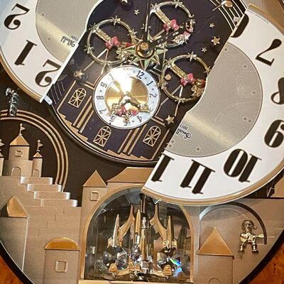 LOT 13.  SMALL WORLD RhYTHUM GRAND TIMECRACKER MUSICAL MOTION WALL CLOCK