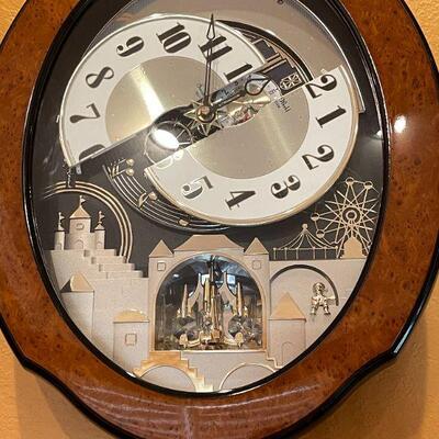 LOT 13.  SMALL WORLD RhYTHUM GRAND TIMECRACKER MUSICAL MOTION WALL CLOCK