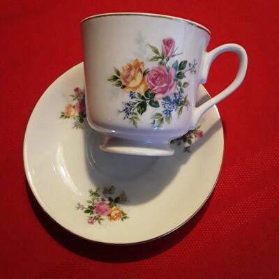 Yellow and pink roses tea cup and saucer