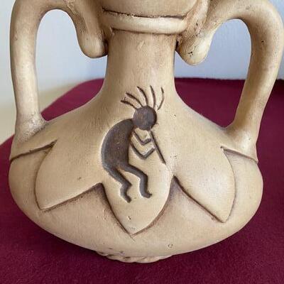 Lot 105- Stoneware Pottery with Kokopelli
