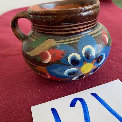 Lot 121 - Pottery small pitcher