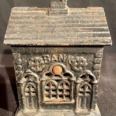 Lot 12: Artillery Cast iron bank and more 