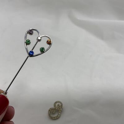 .175. MODERN | Two Womenâ€™s Lapel Pins