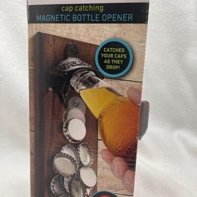 NIB Sharper Image bottle opener 