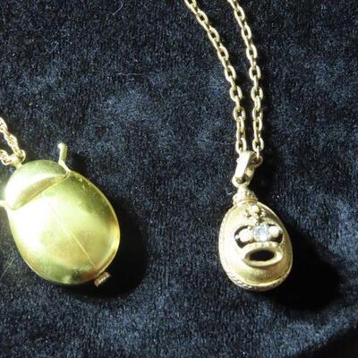2 gold Tone necklaces