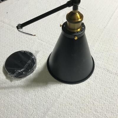 2 of 4 Black sconces with brass accent