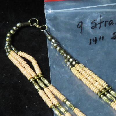 9 strand shell necklace 
