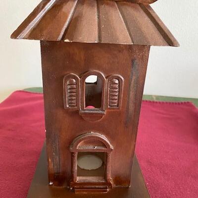 Lot 185 - Birdhouse candleholder