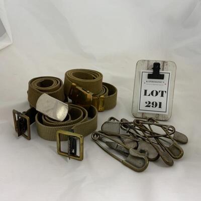 .291. Five Military-Issue Belts | Nine Military-Issue Safety Pins