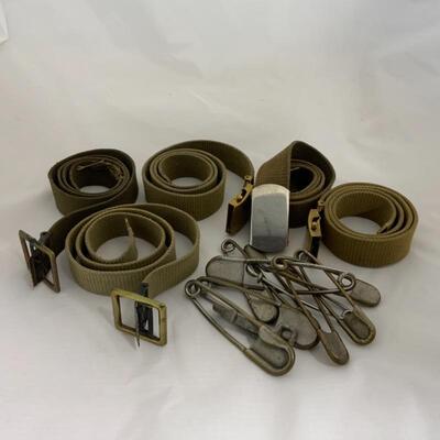 .291. Five Military-Issue Belts | Nine Military-Issue Safety Pins
