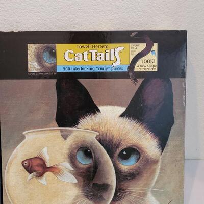 Lot 46: (2) Cat Puzzles