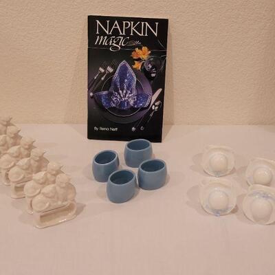 Lot 100: Napkin Rings & Book Lot