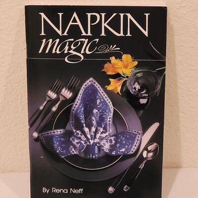Lot 100: Napkin Rings & Book Lot