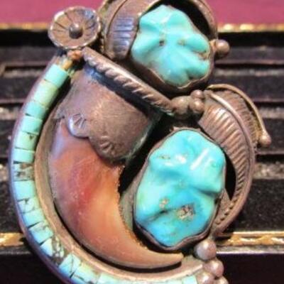 LOT 32  MEN'S TURQUOISE & CLAW SET IN STERLING