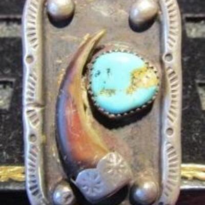 LOT 35  TURQUOISE & CLAW RING SET IN STERLING 