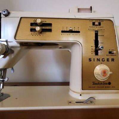 Lot 48: Singer Sewing Machine and Vintage chair 