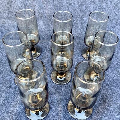 LOT 42  VINTAGE SMOKEY GLASS FOOTED DRINK GLASSES