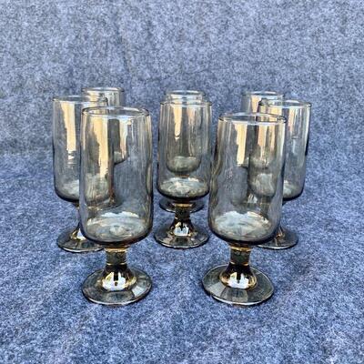 LOT 42  VINTAGE SMOKEY GLASS FOOTED DRINK GLASSES