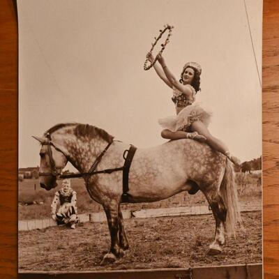 Circus woman on horse photograph