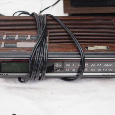 Lot 63 Clock radios, HP Scanner flatbed, various leather vintage holders