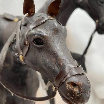 2 leather horses