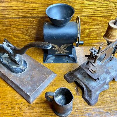 Lot 19: Vintage mini sewing machine, leather rivet cutter and more