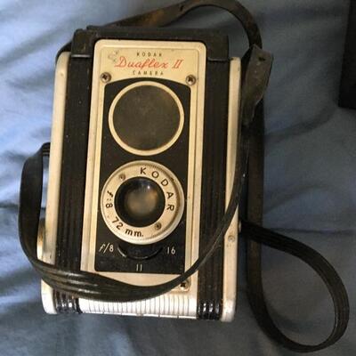 Collection of 6 Vintage Cameras and one Tripod. Includes Voigtlander, Brownie No 2, Polaroid Swinger, Kodak Duraflex and more...
