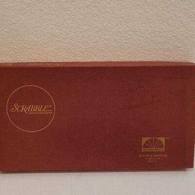 Lot 210: Scrabble, Sequence Dice and Double 9 Dominos 
