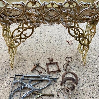 Lot 83: Cast iron planter, horse shoes and more 