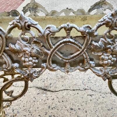 Lot 83: Cast iron planter, horse shoes and more 