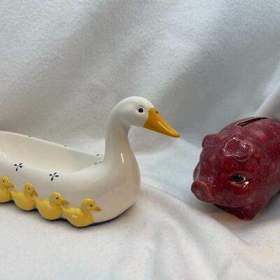 Wayward farm animals.  Piggy bank and bean dip bowl? Remote control holder?