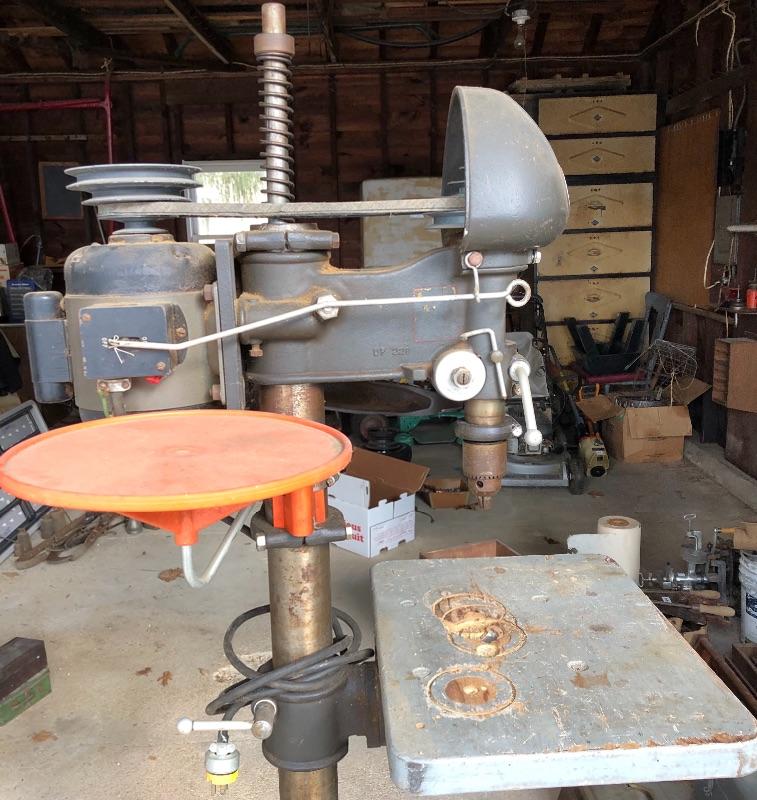 Lot 89 G Vintage Delta drill press with two boxes of bits