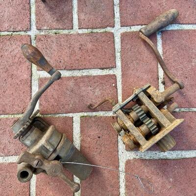 Lot 90: Vintage cast iron tree stand and antique sprinkler