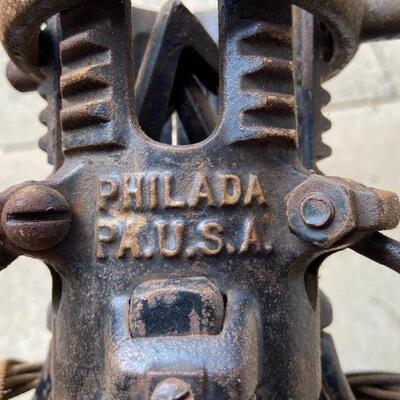 Lot 90: Vintage cast iron tree stand and antique sprinkler
