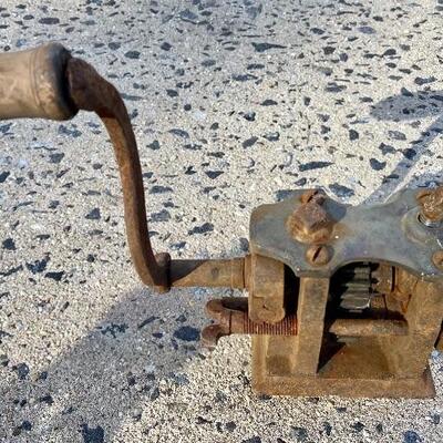 Lot 90: Vintage cast iron tree stand and antique sprinkler