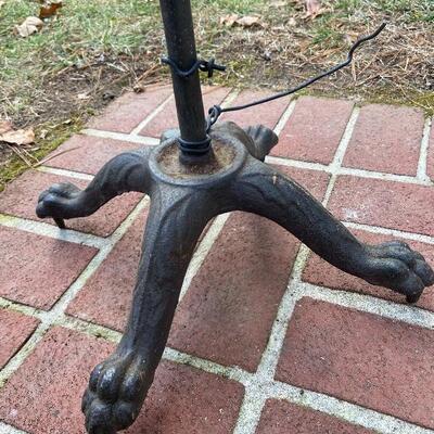 Lot 90: Vintage cast iron tree stand and antique sprinkler