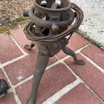 Lot 90: Vintage cast iron tree stand and antique sprinkler