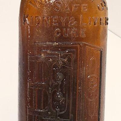 Lot 134: Rare Warners Safe Left-Handed Bottle