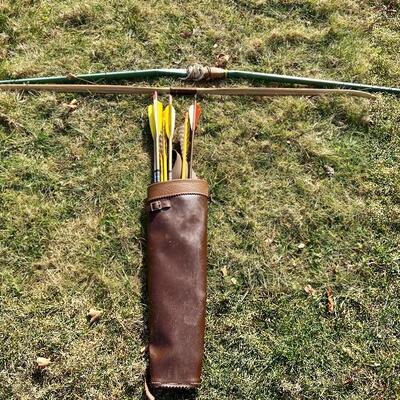 Lot 153: Paul Bunyan Long Bow & Vintage Archery set 